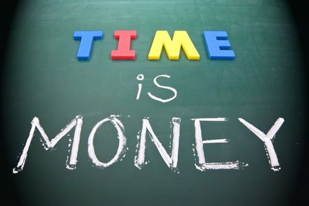 Time is money, business words on blackboard.の写真素材