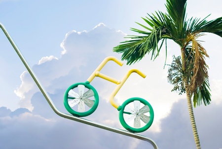Ride bicycle to sky under sunny dayの写真素材