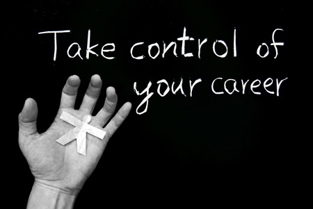 Take control of your career. Words and human hand  on blackboard.の写真素材