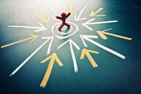 Stress on the man. many arrow head toward the man.の写真素材