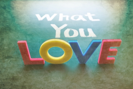 What you love concept, words on blackboardの写真素材