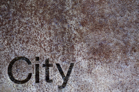 City word carved on the retro texture wallの写真素材
