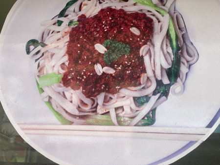 Rice noodles with vegetables in a restaurant in Beijing, China.の写真素材