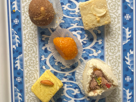 indian sweets on a plate, close up of a traditional indian sweetsの写真素材