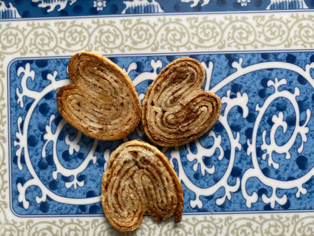 Biscuits in the form of a heart on a blue plateの写真素材