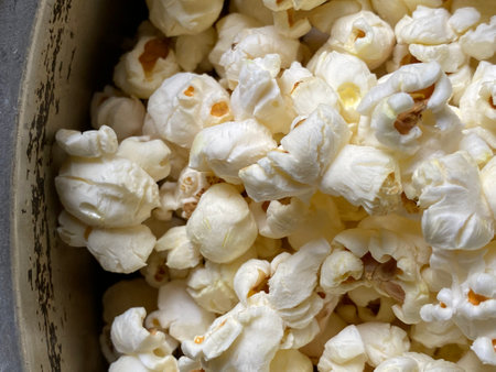 Popcorn in a bucket, close-up, top view.の写真素材