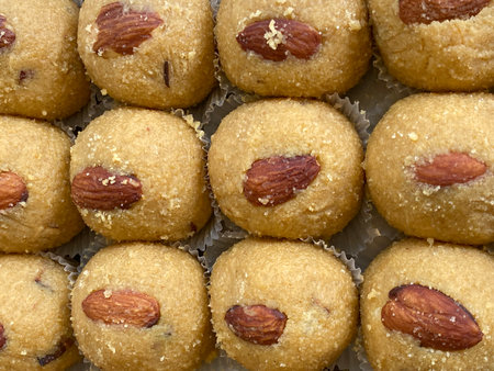 Close-up of Almond cookies with almonds in a paper trayの写真素材
