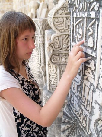 Touch to the sacred. Ruins of an ancient mosque.の写真素材
