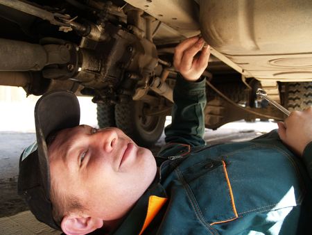 The professional Mechanic behind work. Lorry repair.の写真素材
