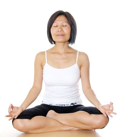 Woman sitting in lotus positionの写真素材