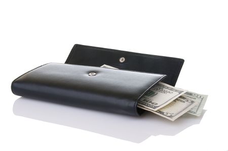 Black wallet with cash spending money spilling out as though personal spending restrictions are...