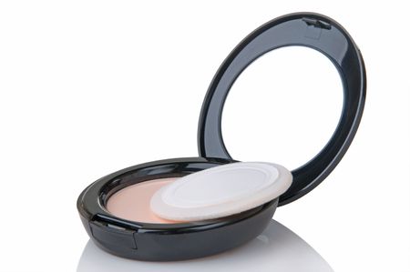 Compact containing makeup powder with puffの写真素材