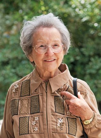 Healthy senior lady 88 years of age out walking and enjoying sunny weather