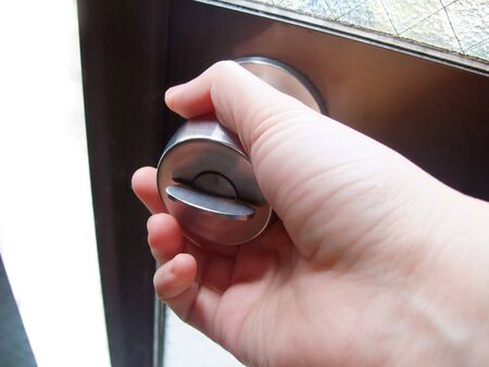 Turn the knob to open the door