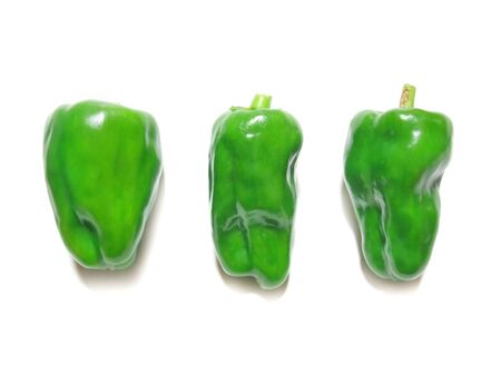 There are three green peppersの写真素材