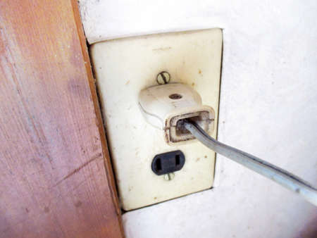 Outlet with a plug