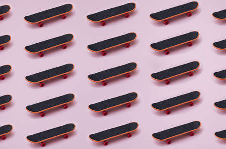 Skateboard on a pink background. Pattern.の写真素材