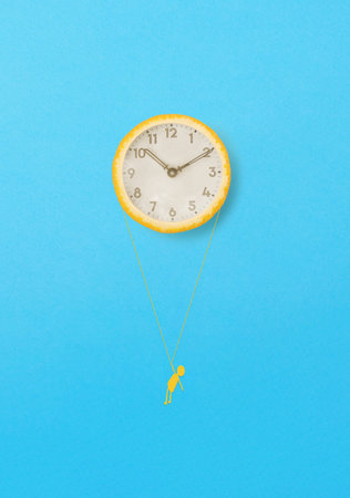 An old retro clock inside an orange. The rope is drawn. Minimal scene with blue background. The boy...