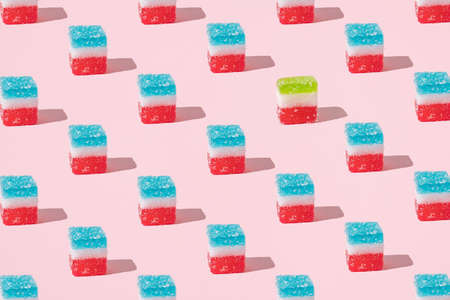 Cute little checkered jelly candies in the color of the flag. Minimal pattern. Rectangular candies reminiscent of the flags of France and Italy.の写真素材
