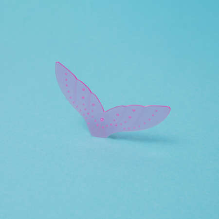 Mermaid tail with  bubbles on blue background. Minimal design.