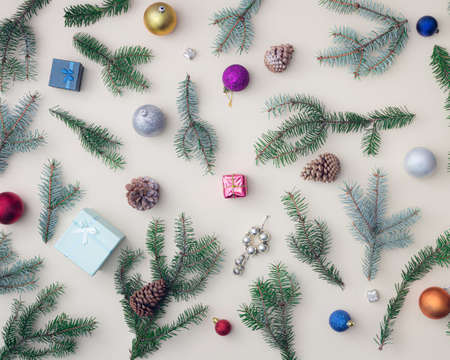 Beautiful Christmas new year decoration scene with tree, baubles, pinecone, bell, silver and red...