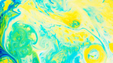 Fluid Art. Abstract blurred colorful background. Swirl liquid pattern. Marble effect of green color. Trendy colorful backdropの写真素材