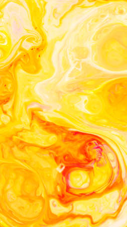 Fluid Art. Abstract blurred colorful background. Swirl liquid pattern. Marble effect of yellow red color. Trendy colorful backdropの写真素材