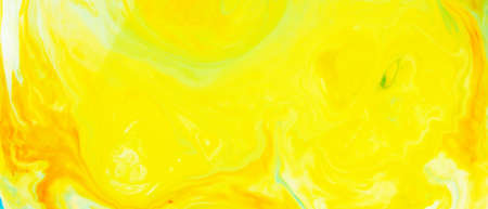 Fluid Art. Abstract blurred colorful background. Swirl liquid pattern. Marble effect of yellow...