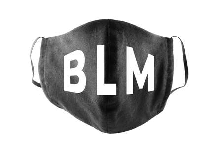 BLM on face mask. White protective mask on white background. Concept of protest against racism and violence. Isolatedの写真素材