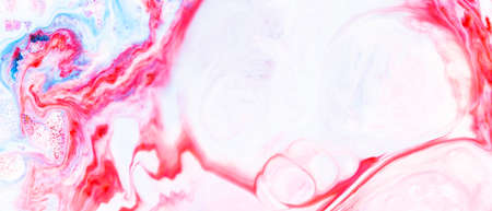 Fluid art. Abstract colorful background, wallpaper. Liquid marbling background. Mixed blue and light pink paints. Trendy colorful backdropの写真素材