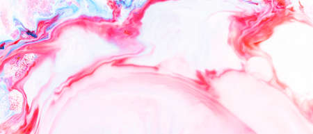 Fluid art. Abstract colorful background, wallpaper. Liquid marbling background. Mixed blue and light pink paints. Trendy colorful backdropの写真素材