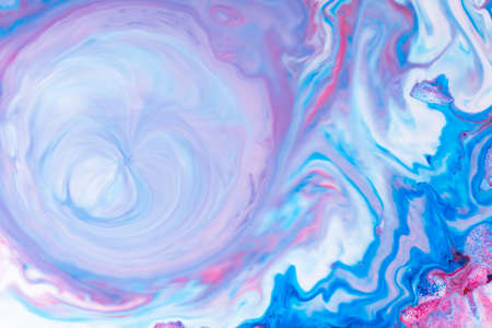 Fluid art. Abstract lilac pink background. Liquid marble texture design. Blue pink pattern Blue-pink pattern with liquid materialの写真素材
