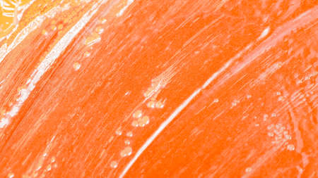 Abstract orange background. Orange colored texture. Pastel colorsの写真素材