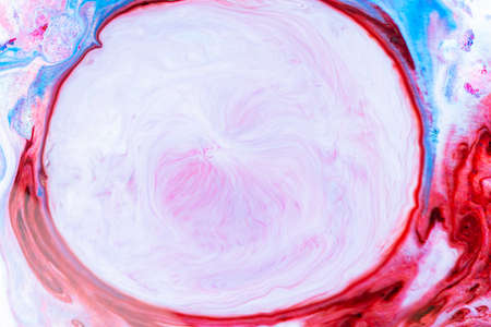 Abstract gradient colorful background. Multicolor trendy backdrop. Stains of paint on the water....