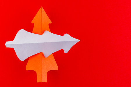 Red paper christmas tree. Paper Christmas tree on a red background. New Year decorationの写真素材