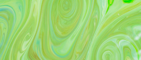 Green fluid art background. Liquid abstract pattern with UFO green. Marble texture of liquid...