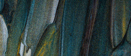 Texture of nail polish. Beautiful turquoise stains of liquid nail polish. Concept of fashion and...