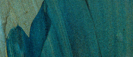 Texture of turquoise nail polish. Blue green stains of liquid nail polish. Concept of beauty...