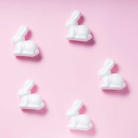 Easter bunnies on a pink background. Easter decoration concept. top viewの写真素材