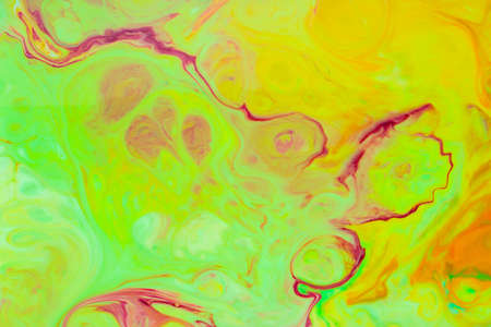 Abstract green-orange fluid art background. Backdrop with abstract mixing paint effect. Liquid...