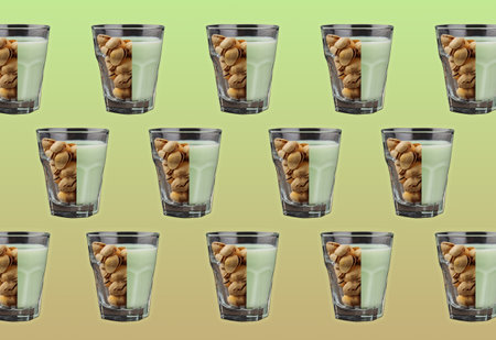 Pattern with a glass of pistachio milk and pistachios. Creative concept of organic lactose free pistachio milk. Healthy vegan drink with pistachiosの写真素材