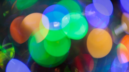 Multicolored Festive Background with Vibrant Gradient and Cheerful Bokeh Lightsの写真素材