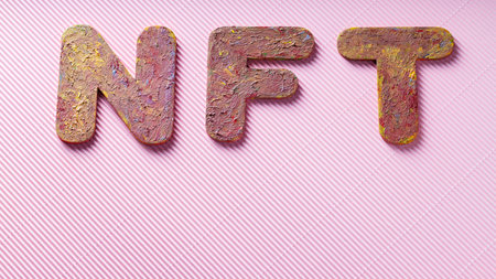 NFT Letters with Textured Colorful Paint Finish on Pink Background, Non-Fungible Token Concept, Copy...