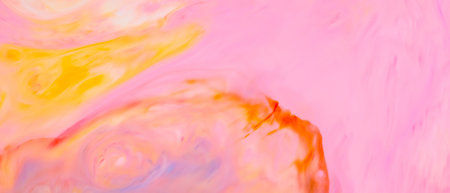 Fluid Art Background with Vibrant Mix of Pink, Yellow, Blue Spots and Stains on Liquid Surfaceの写真素材