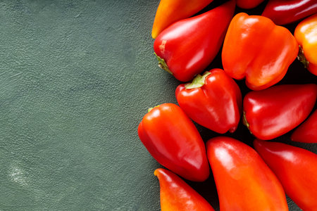 Ripe Red and Orange Peppers from Local Farmers Market for Vegan Kitchen Use, Top View, Copy Spaceの写真素材