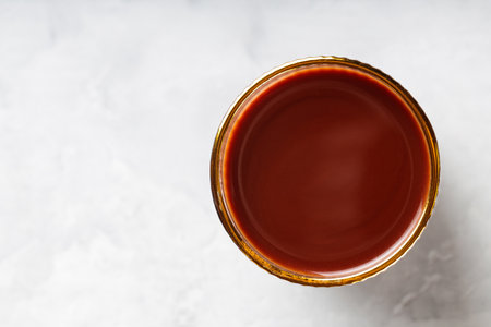 Cocoa Drink in Glass on Gray Concrete Background, Top View, Copy Spaceの写真素材