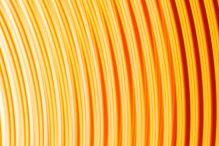 Flowing Curved Light Lines Orange and Yellow Abstract Backgroundの写真素材