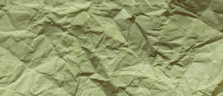 Minimal Grunge Texture of Crumpled Green Wrapping Paperの写真素材