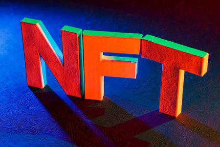 Non-Fungible Token Symbol in Neon Red and Blue Digital Economy Styleの写真素材