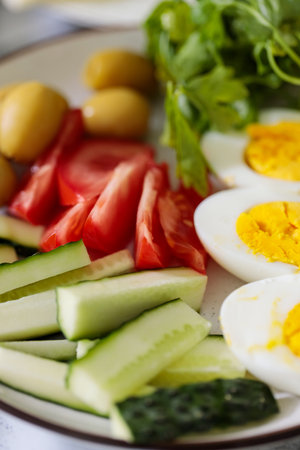 Boiled Eggs and Fresh Vegetables Healthy Breakfast Plateの写真素材